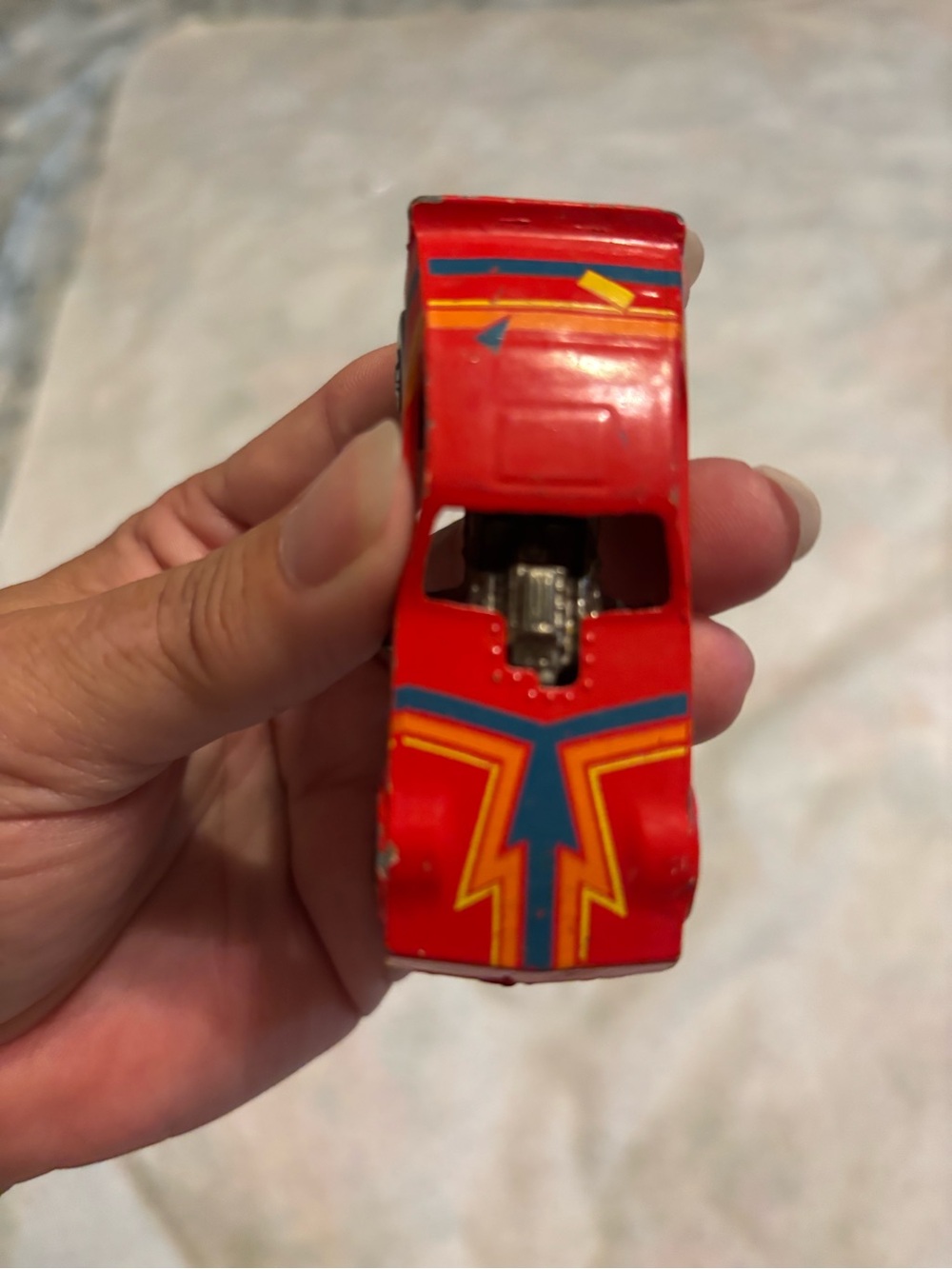 Vintage die-cast toy vehicle featuring Funny car